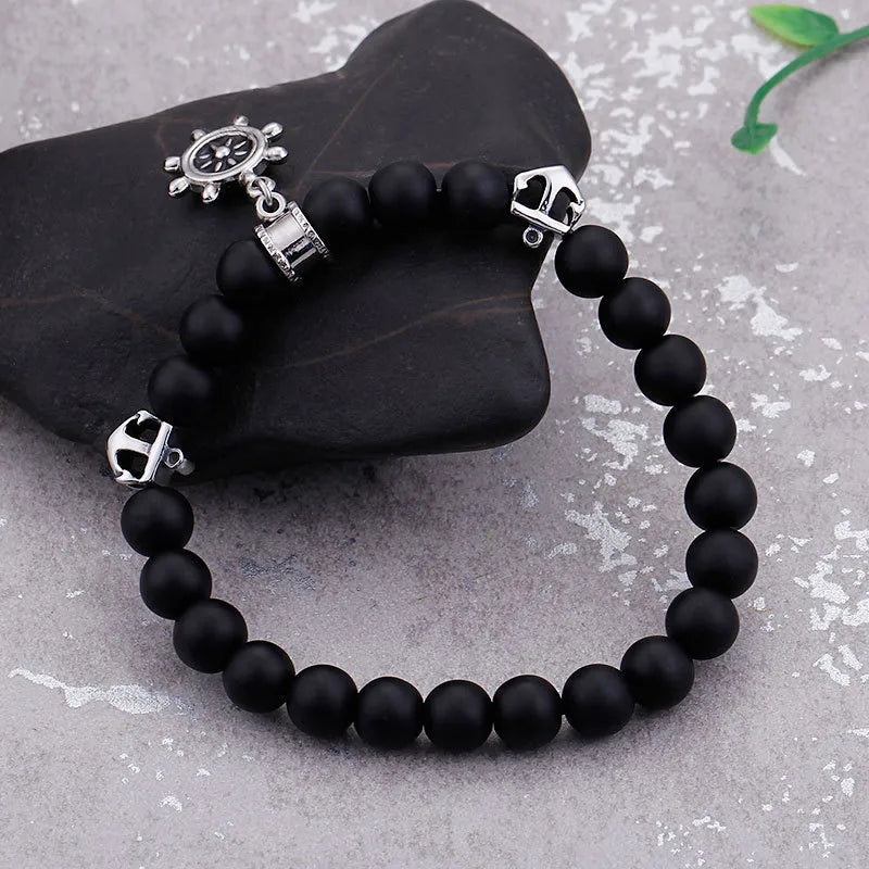 Matte Black Beaded Nautical Charm Bracelet for Men – Anchor & Wheel Accents