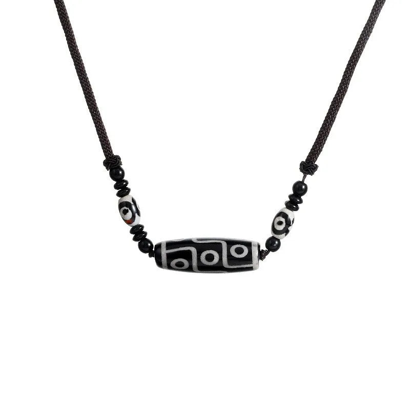 Tibetan Dzi Bead Necklace – Black & White Resin Amulet on Adjustable Rope